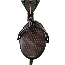 Close-up of Audeze headphone showcasing a sleek black design with a unique textured ear cup and elegant copper accents.